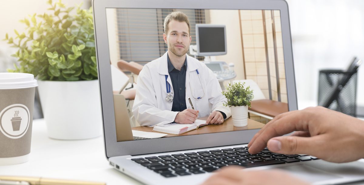 A patient participating in a virtual visit with their health care provider.