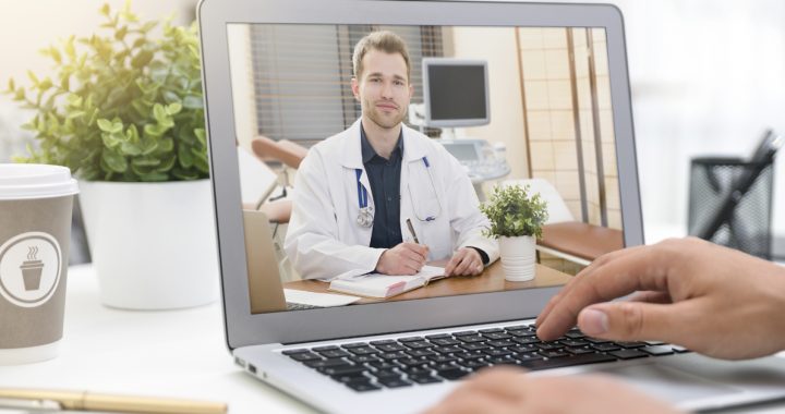 A patient participating in a virtual visit with their health care provider.