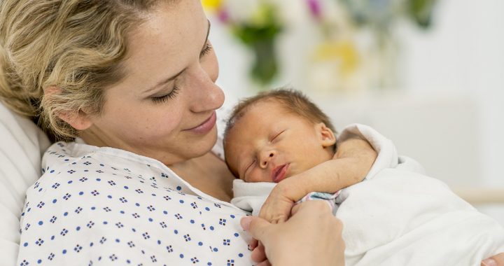 A mother giving birth safely at the hospital during COVID-19.