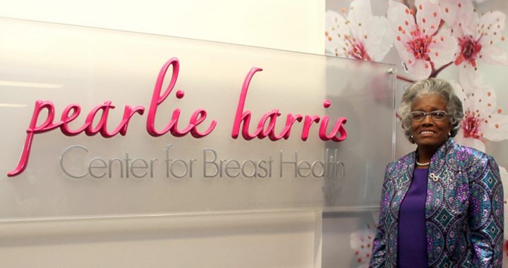 Pearlie Harris next to her sign at the Bon Secours breast cancer center in Greenville, SC