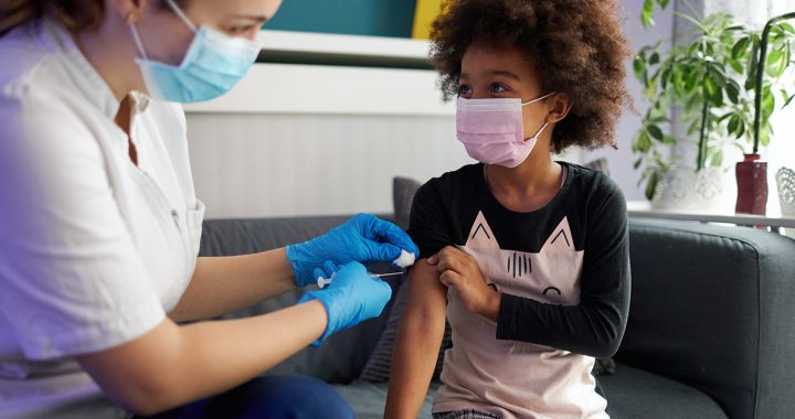 A child getting their flu shot.
