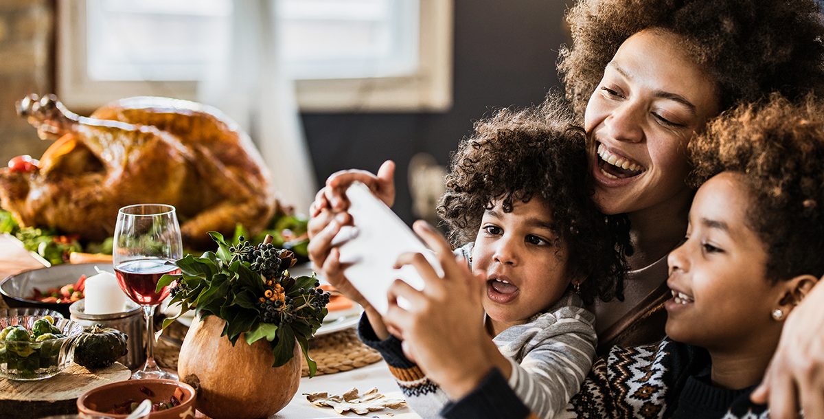 A family celebrating Thanksgiving virtually