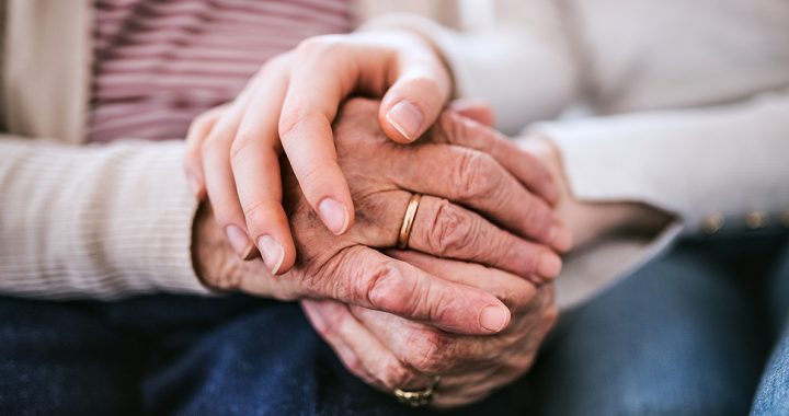 Two people holding hands.