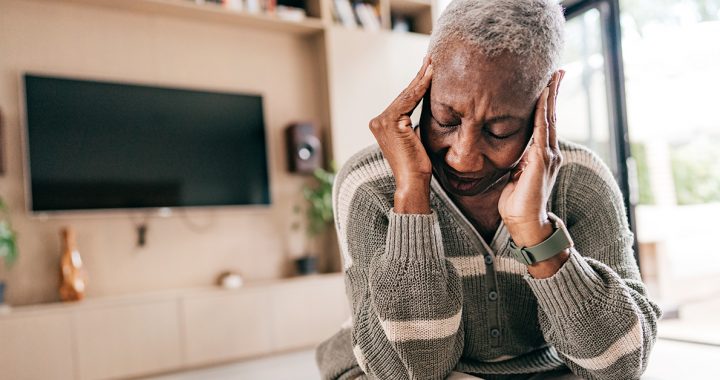 A woman suffering from a migraine