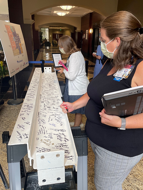 Team Signs Beam for New Emergency Center Bon Secours Blog
