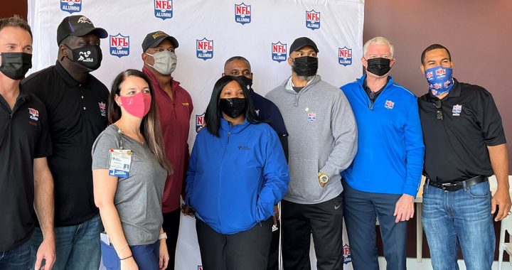 NFL alumni at the COVID-19 vaccine event.