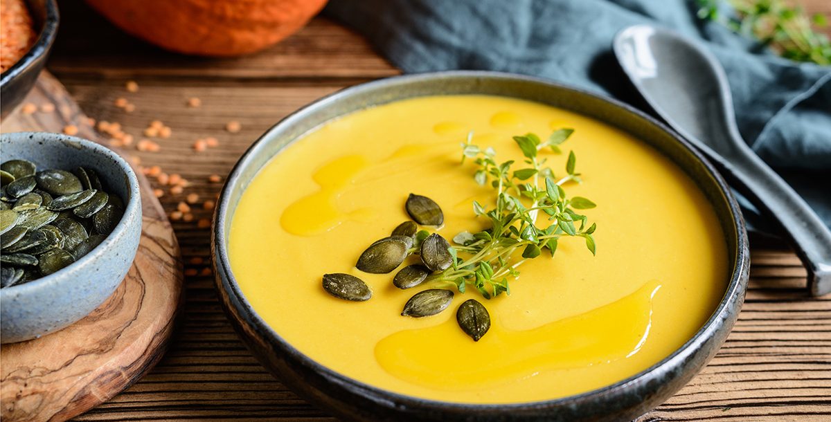 A bowl of pumpkin lentil soup